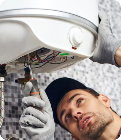 Fixing a water heater thermostat in Dubai.