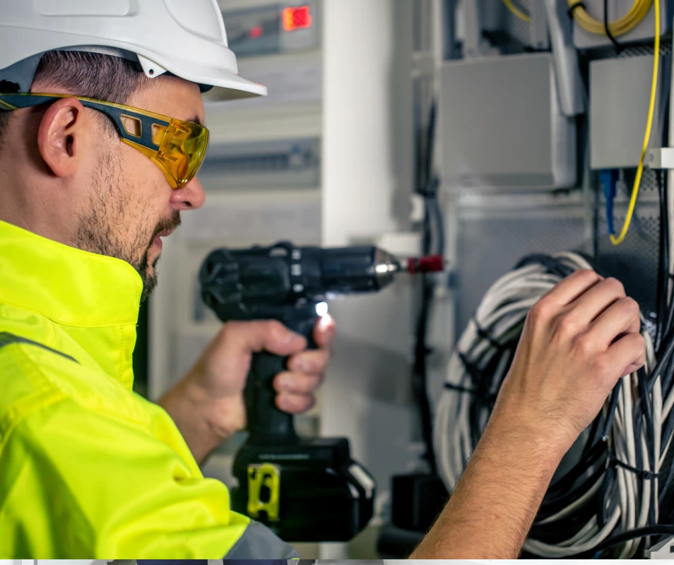 Water Heater Electrical Repair Dubai Fixing bathroom water heater connections for electrical repair in Dubai